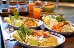 Pad Thai noodles from Thip Samai and mango sticky rice in Bangkok night market