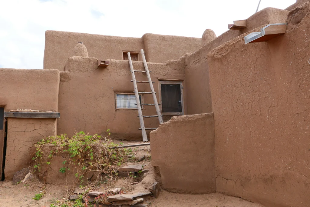 Hidden small towns in the USA Taos snowy adobe houses
