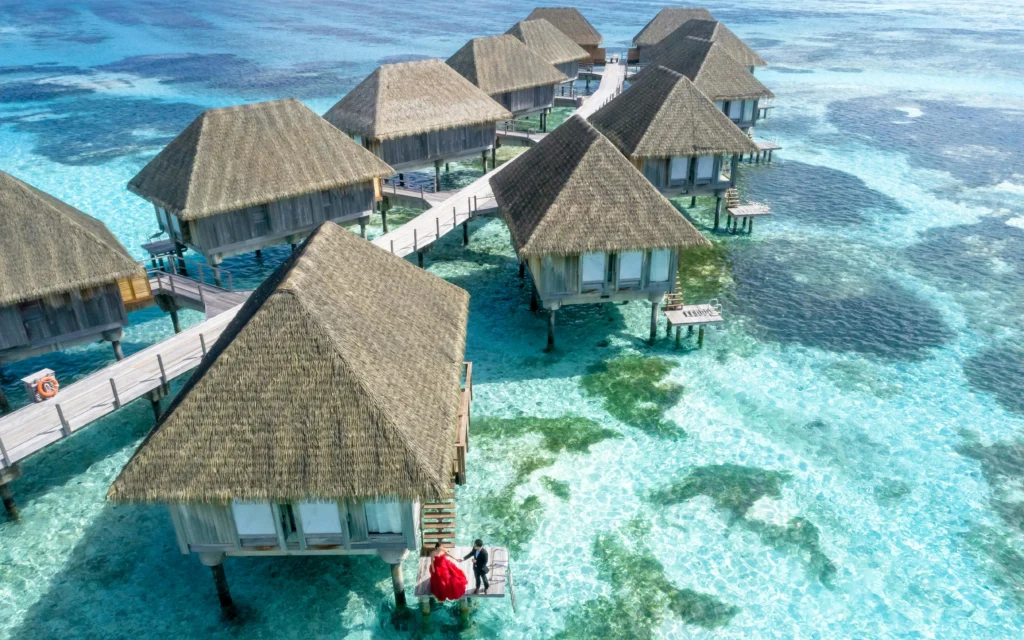 Overwater villas in Maldives lagoon – warm places to visit in December